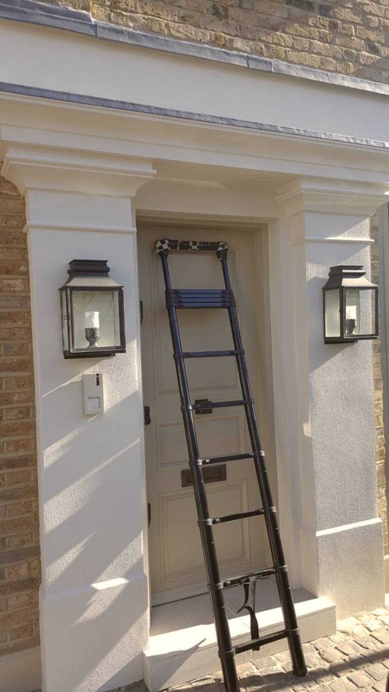 Rendered entrance lintel prepared for property signwriting at a residential property in Kensington.