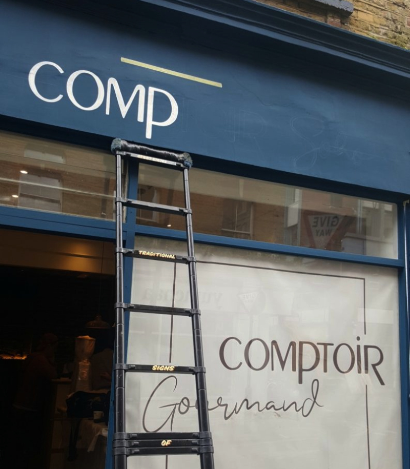 Commercial fascia signwriting in progress for Comptoir Gourmand in Soho, London.
