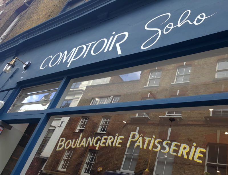Completed commercial glass signwriting for Comptoir Gourmand in Soho, London, with white lettering and 23ct gold leaf.