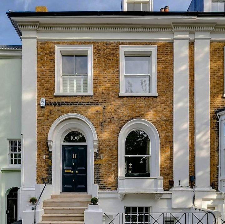 Grade II listed Regency villa in Barnes, London featuring a hand-painted fanlight number above the entrance.