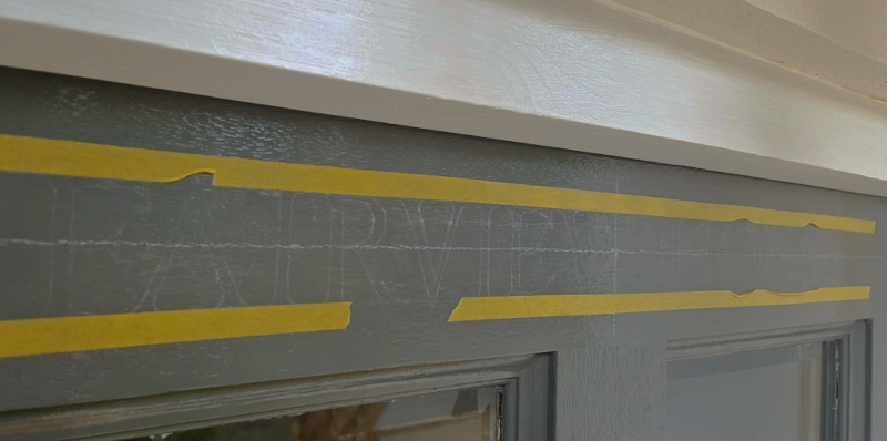 Reliefed house name lettering prepared for traditional hand painted entrance signage in Enfield.