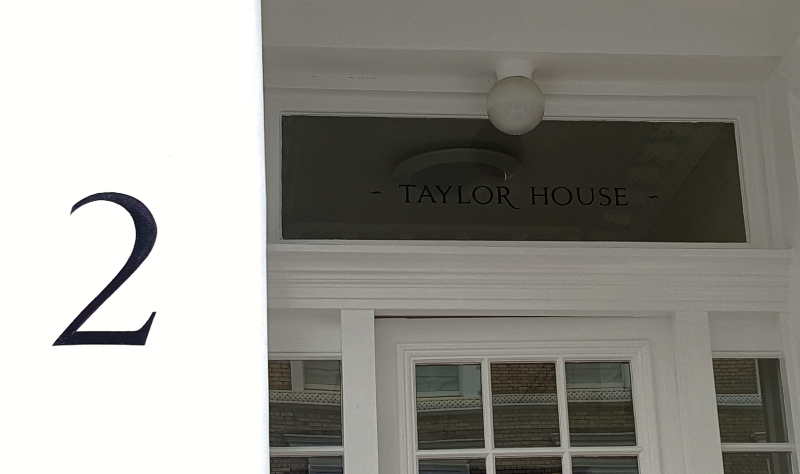 Entrance pillar numbers and reverse glass lettering completed together.