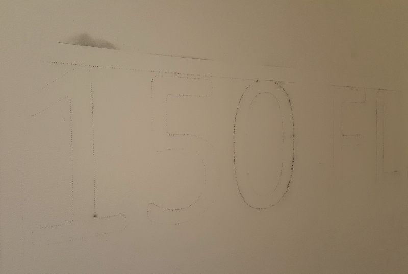 Pounced outline of the Fleet Street address transferred onto the prepared plaster wall before painting.