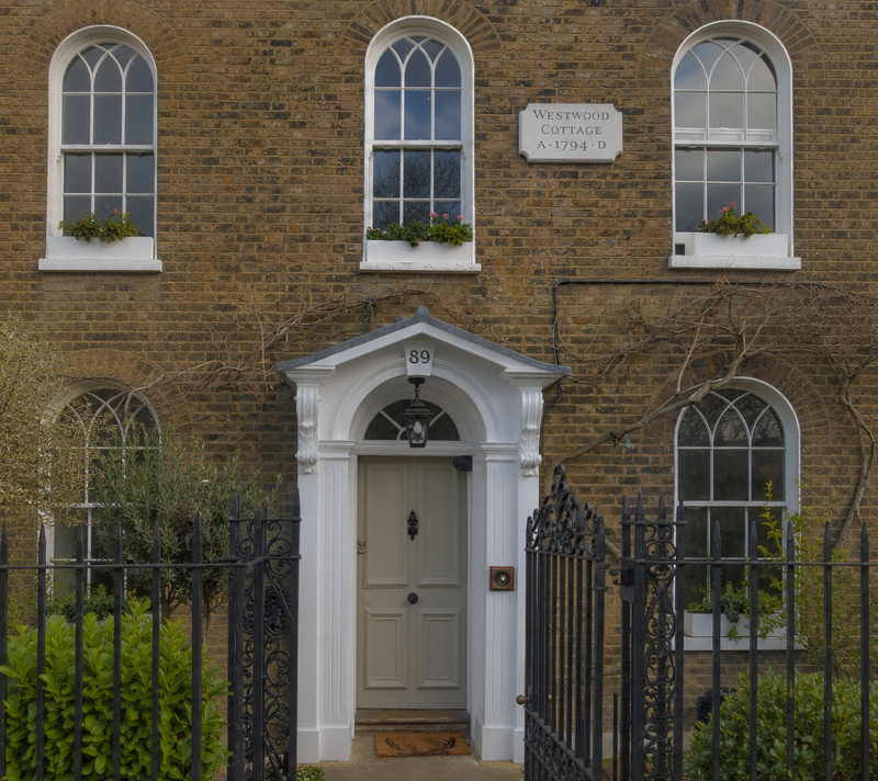 Westwood Cottage in Enfield featuring bespoke painted keystone house numbering above the entrance