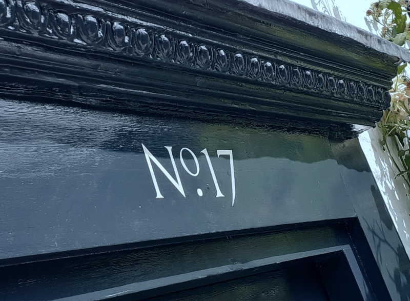 Architectural house name signwriting on London period property