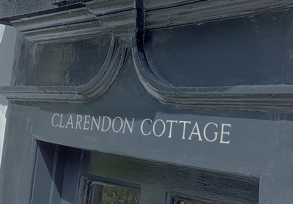 Hand painted house name signwriting on period property in Enfield Chase