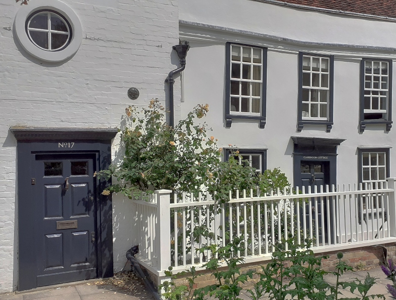 Traditional house name lettering on period cottage