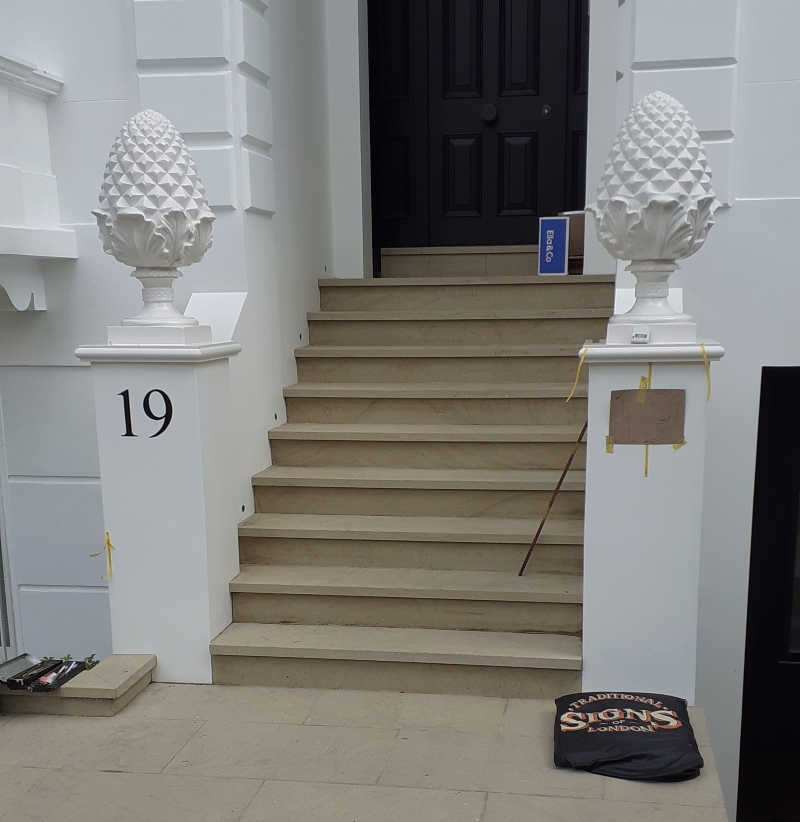 Hand painted residential signwriting on entrance piers