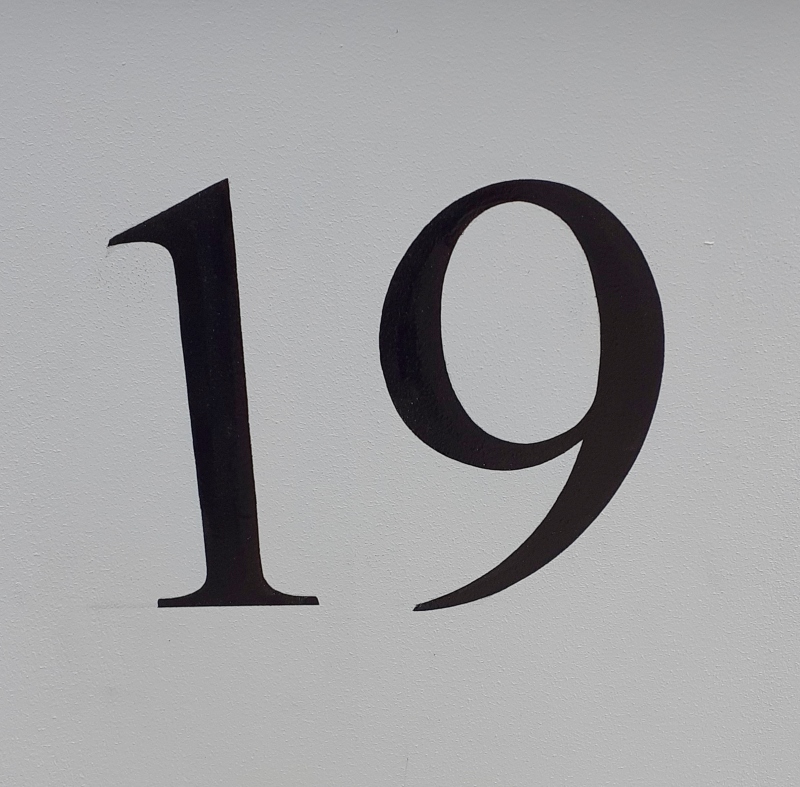Traditional property numbers on London gate piers
