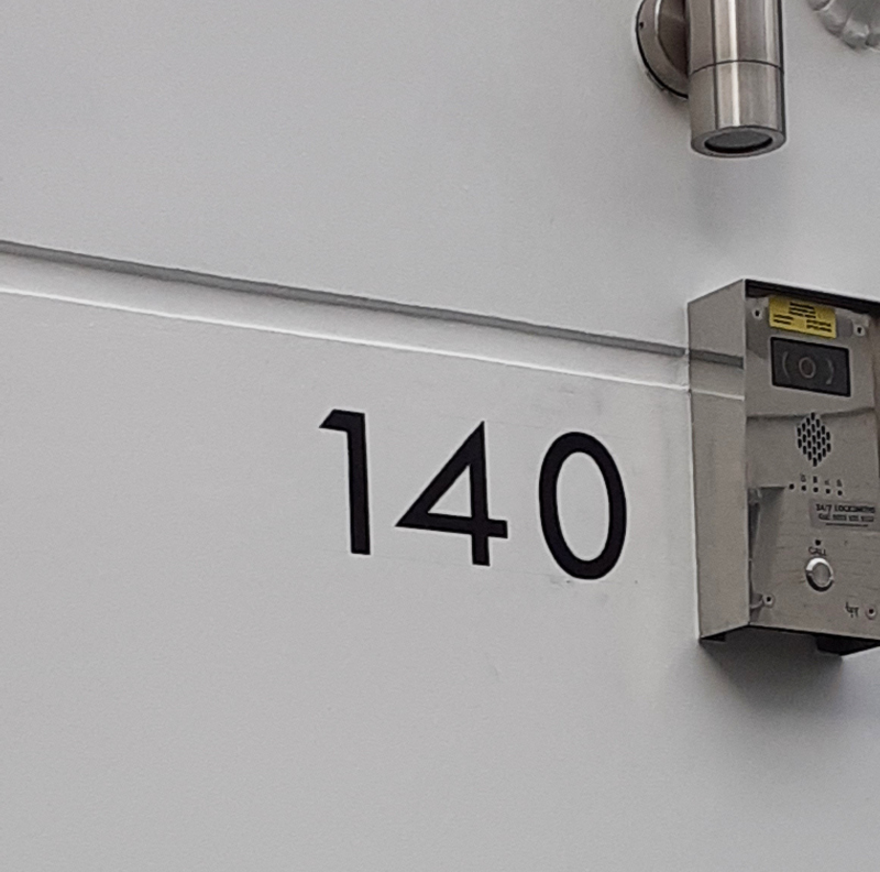 Architectural house numbering on SW3 residential property