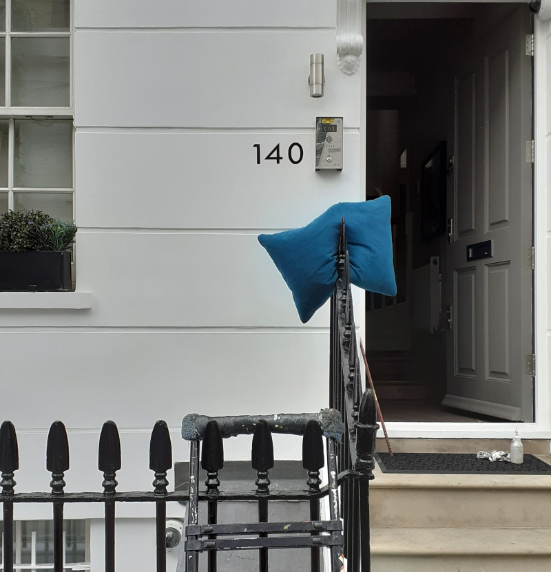 Hand painted entrance numbering near Sloane Square