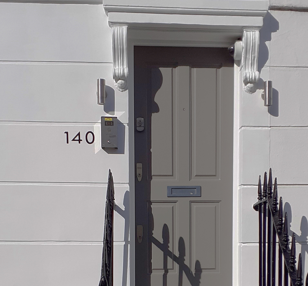 Hand painted house numbers on SW3 London property