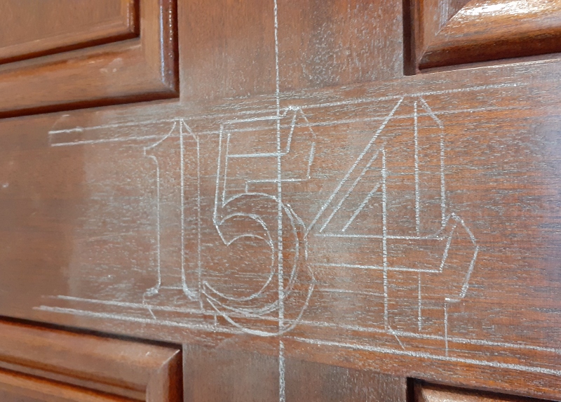 Hand painted residential door numbering in London