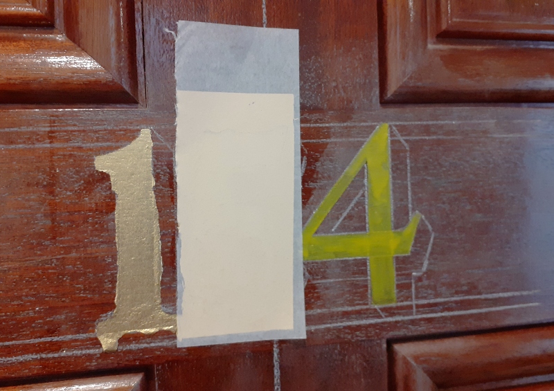 Matte gold leaf apartment numbering painted by hand