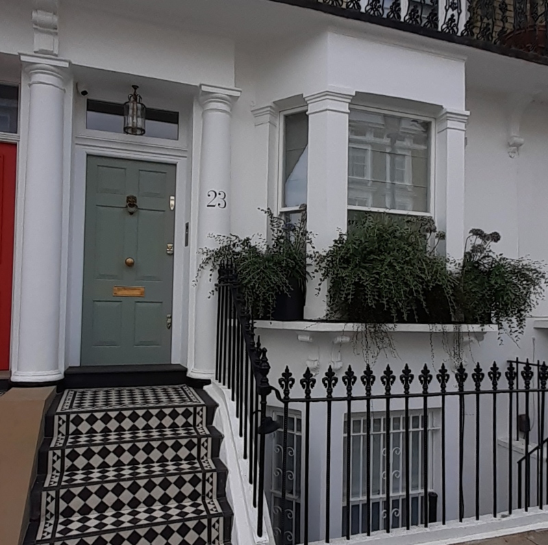 Traditional house number signwriting in West London