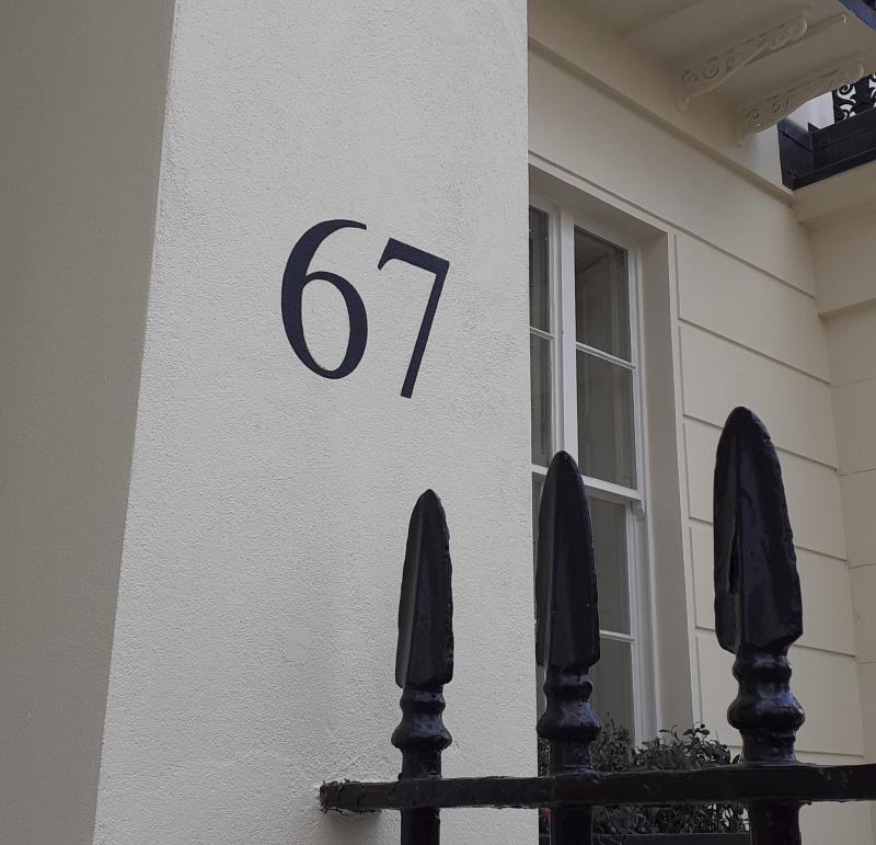 Bespoke residential entrance signwriting in Chester Square