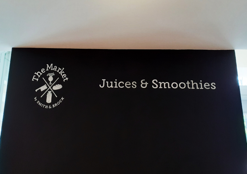 Hand painted menu board branding and heading in South Kensington eatery