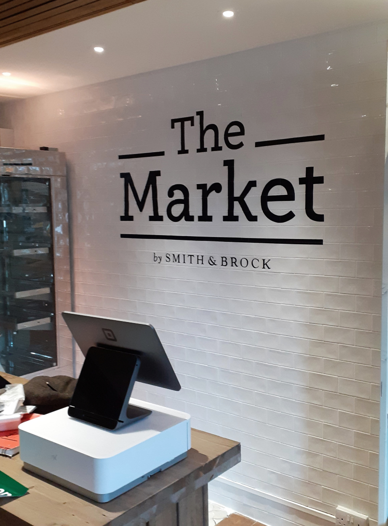 Interior feature wall signwriting in West London hospitality interior