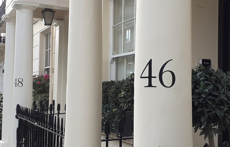 Hand painted portico pillar numbers on Belgravia residence