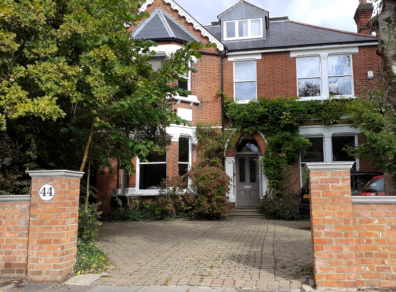 Traditional hand painted house number signwriting in London