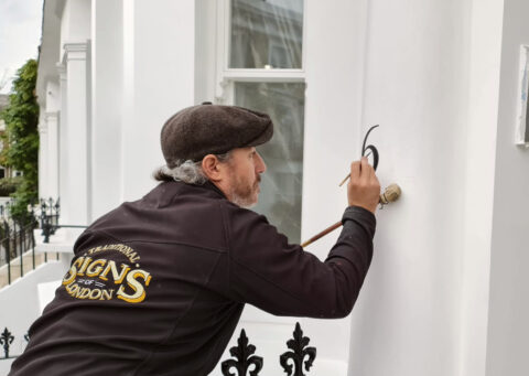 Traditional signwriting London on an external West London residence
