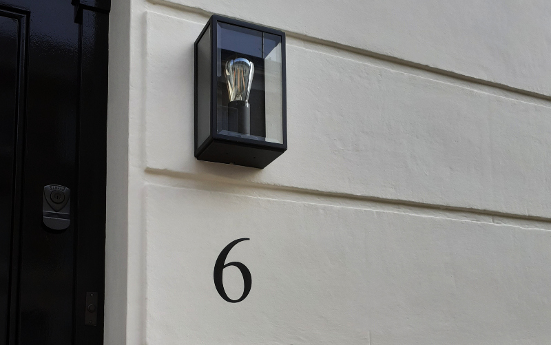 painted house numbers on stucco London
